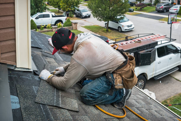 Professional Gutter Repair And Installation technician working in Russell, IA